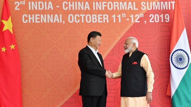 Leaders of India, China meet to defuse border tensions