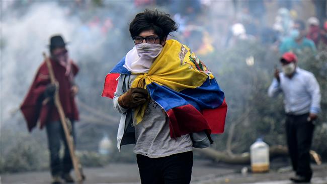Ecuador government, protesters agree to talk amid curfew