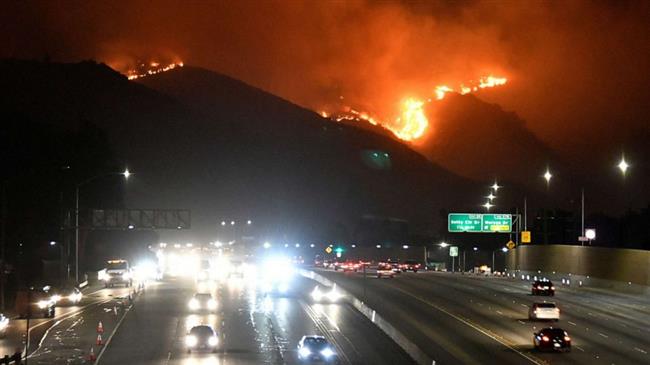 California wildfires erupt in wealthy side of Los Angeles