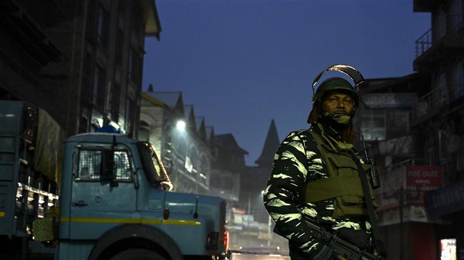 India divides Kashmir to tighten grip over Muslim state  