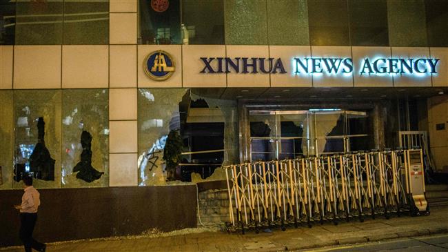 Hong Kong rioters vandalize Xinhua office, public property 