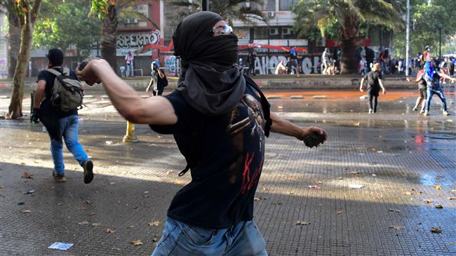 Protests continue in Chile, president remains defiant