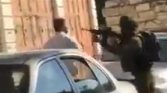 Video: Israeli soldiers assault Palestinian man before son