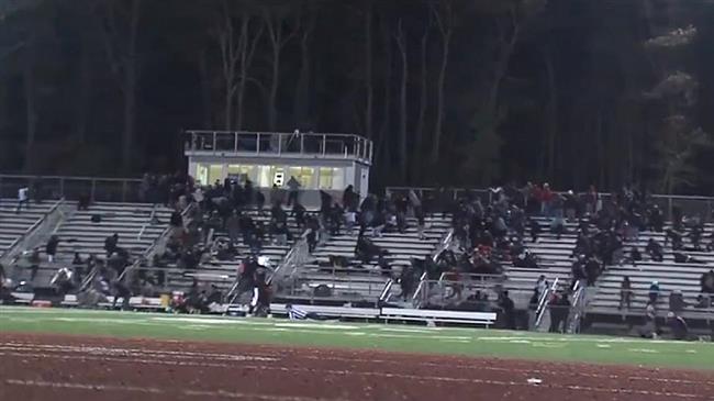 Three people wounded by shooting at US high school football game 