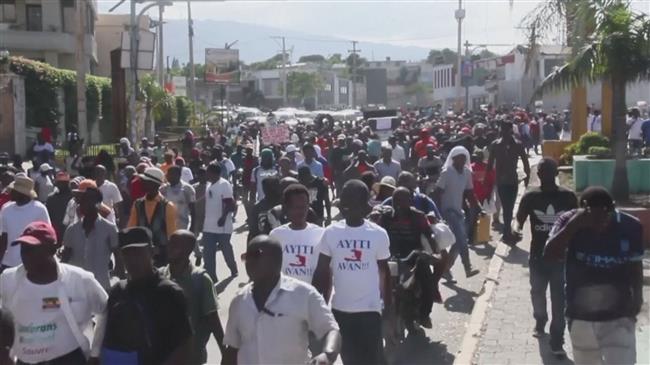 Barricades burn as Haiti protesters head to US embassy