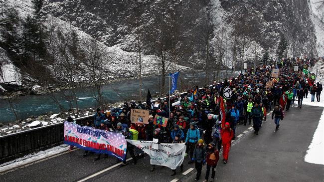 Climate activists set off on mountain hike to Davos 