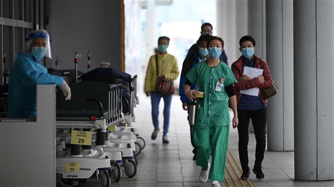 More cities locking down in China over virus outbreak fears