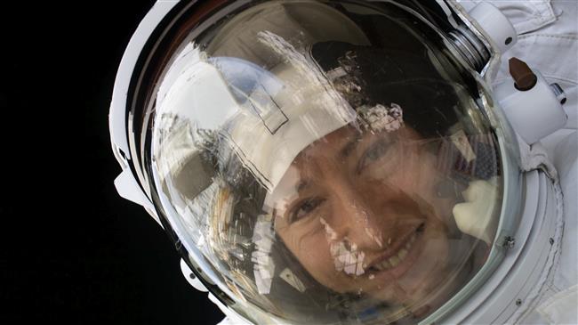 Record-breaking NASA astronaut returns to Earth