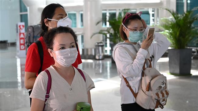 American dies of coronavirus in China as toll set to surpass SARS 