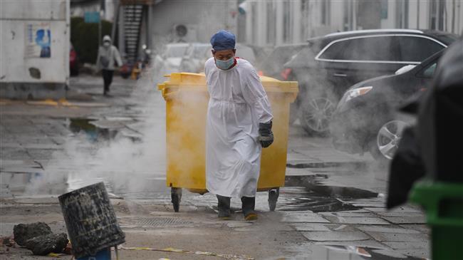 China epidemic slows, prompting cautious optimism
