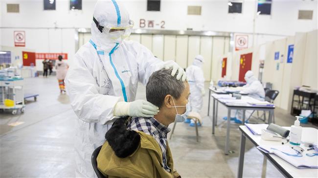 Coronavirus death toll leaps to 1,800 in China