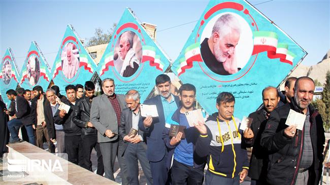 Iranians go to polls in parliamentary elections amid US animosity 