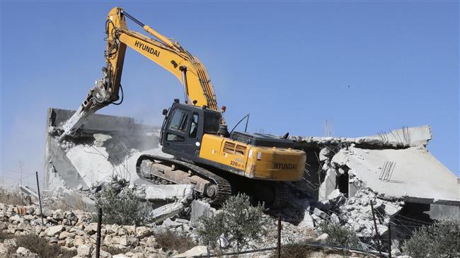 Israeli bulldozer hits Palestinian protester with boulder