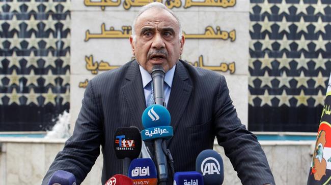 Iraq’s acting PM gives up duties, calls for snap elections