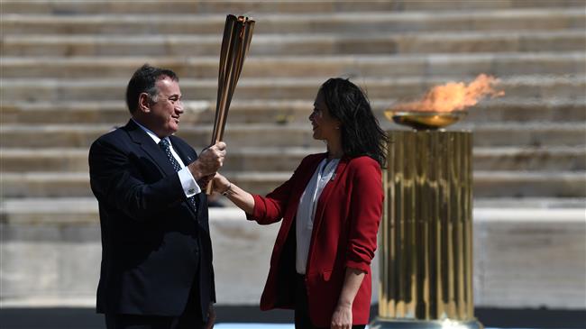 Tokyo 2020 games organizers receive Olympic flame 