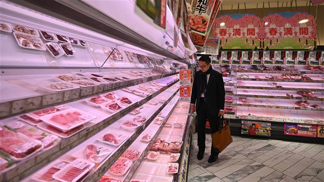 In days of pandemic, Japanese shoppers stock up on supplies