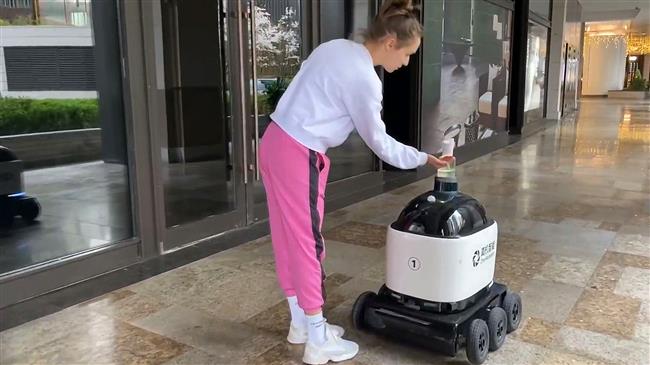 Handy robot dispenses sanitiser amid coronavirus fight in China's Shanghai 