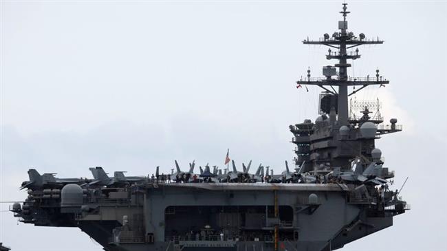 Captain of US aircraft carrier fired after pleading for help over coronavirus
