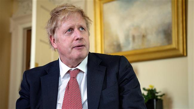 UK PM Johnson under fire over handling of coronavirus crisis