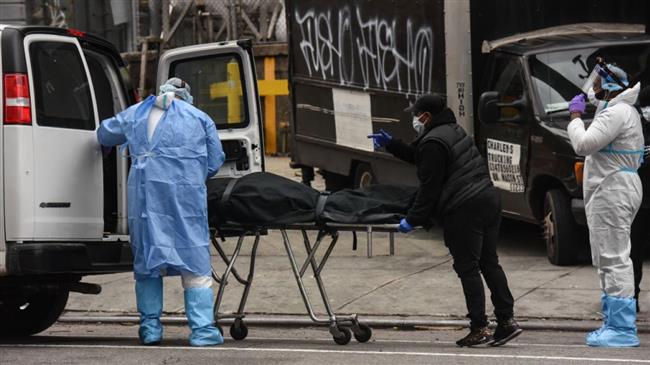 US virus toll tops 61,000; Trump says won't extend social distancing 