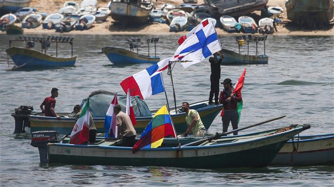 Palestinians in Gaza show support to countries affected by COVID-19