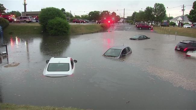 Heavy rain floods parking lot in Massachusetts
