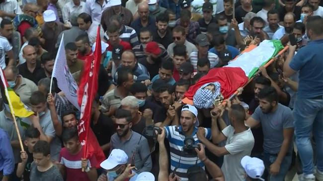 Palestinians hold funeral for man killed by Israeli troops south of Nablus