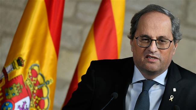 Catalan chief defies justice freeze on lockdown order