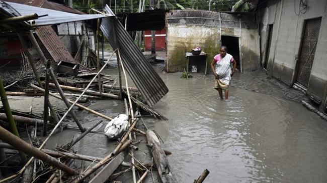 Floods ravage villages in India, killing at least 87