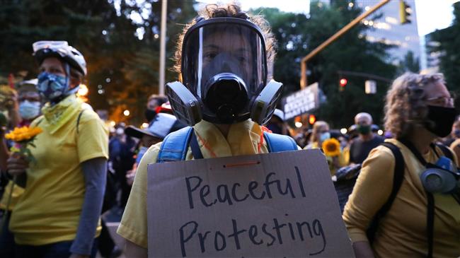 Federal agents fire teargas as protests hit Portland for 50th day