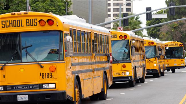 School bus drivers stage noisy protest in Los Angeles 