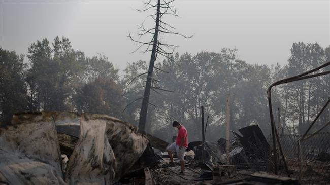 Oregon wildfire melts trucks, leaves warlike destruction in wake
