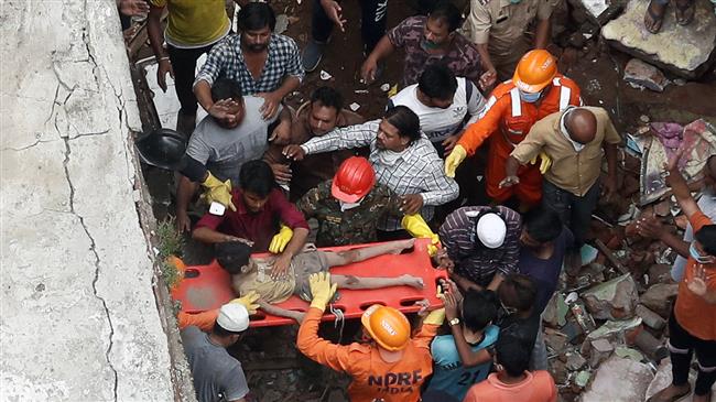 10 dead, dozens feared trapped in building collapse in India