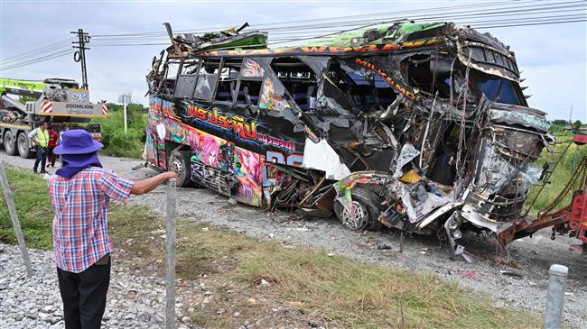 18 dead in Thailand  bus-train collision