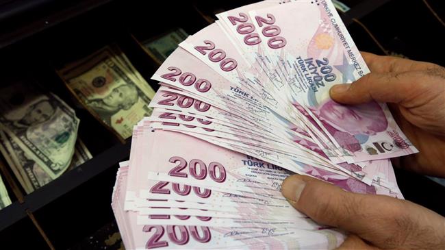 Erdogan dismisses central bank governor over lira plunge