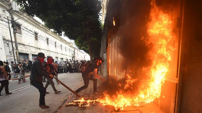 Guatemalan protesters torch Congress over budget cuts 