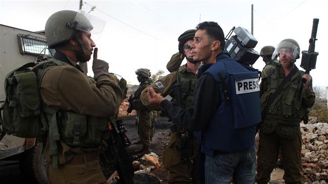 NGO: Israel committed 414 violations against Palestinian journalists this year