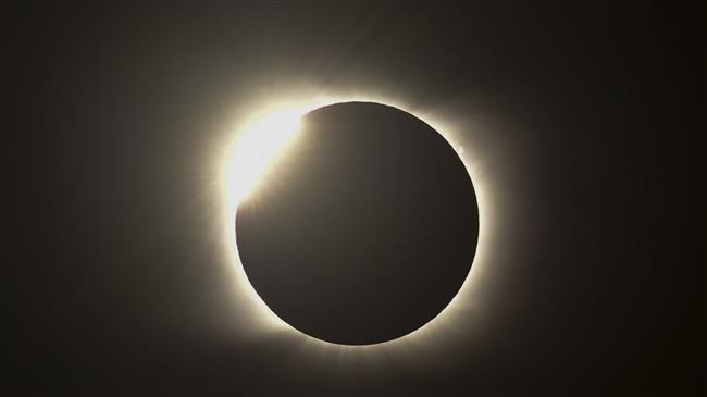 Sun almost fully covered by moon ahead of total eclipse