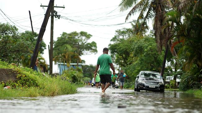 Two dead as powerful cyclone tears across Fiji