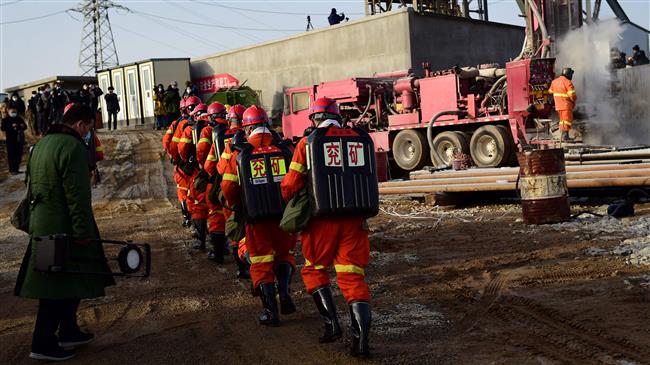 At least 12 workers trapped in China gold mine blast still alive