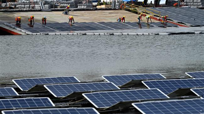 Singapore builds floating solar farms in climate fight