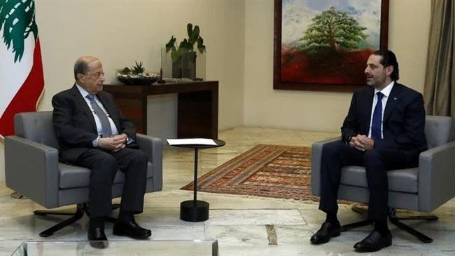 Lebanon's president asks PM-designate Hariri to form new government or leave