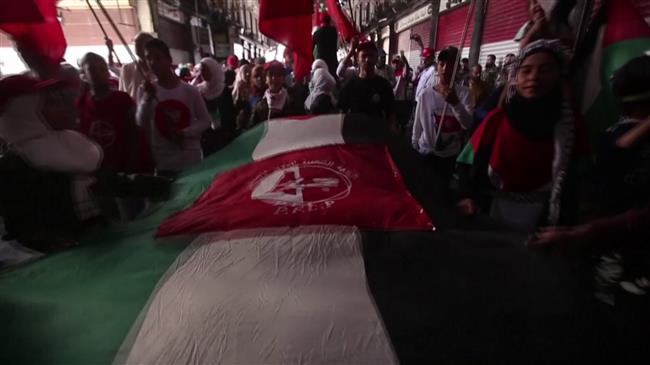 Syrians, Palestinians march though Old Damascus on Quds Day