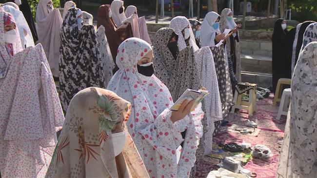 Muslims celebrate Eid al-Fitr amid social distancing