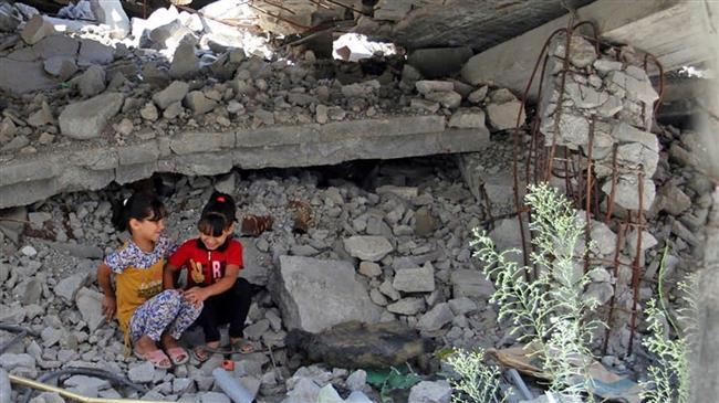 Displaced Gazans camp by the rubble of their homes