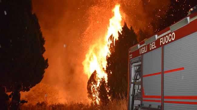Italian wildfires rage on after 49 degree heat record 