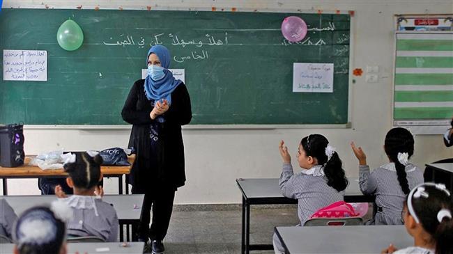 Palestinian girl goes back to school with artificial legs